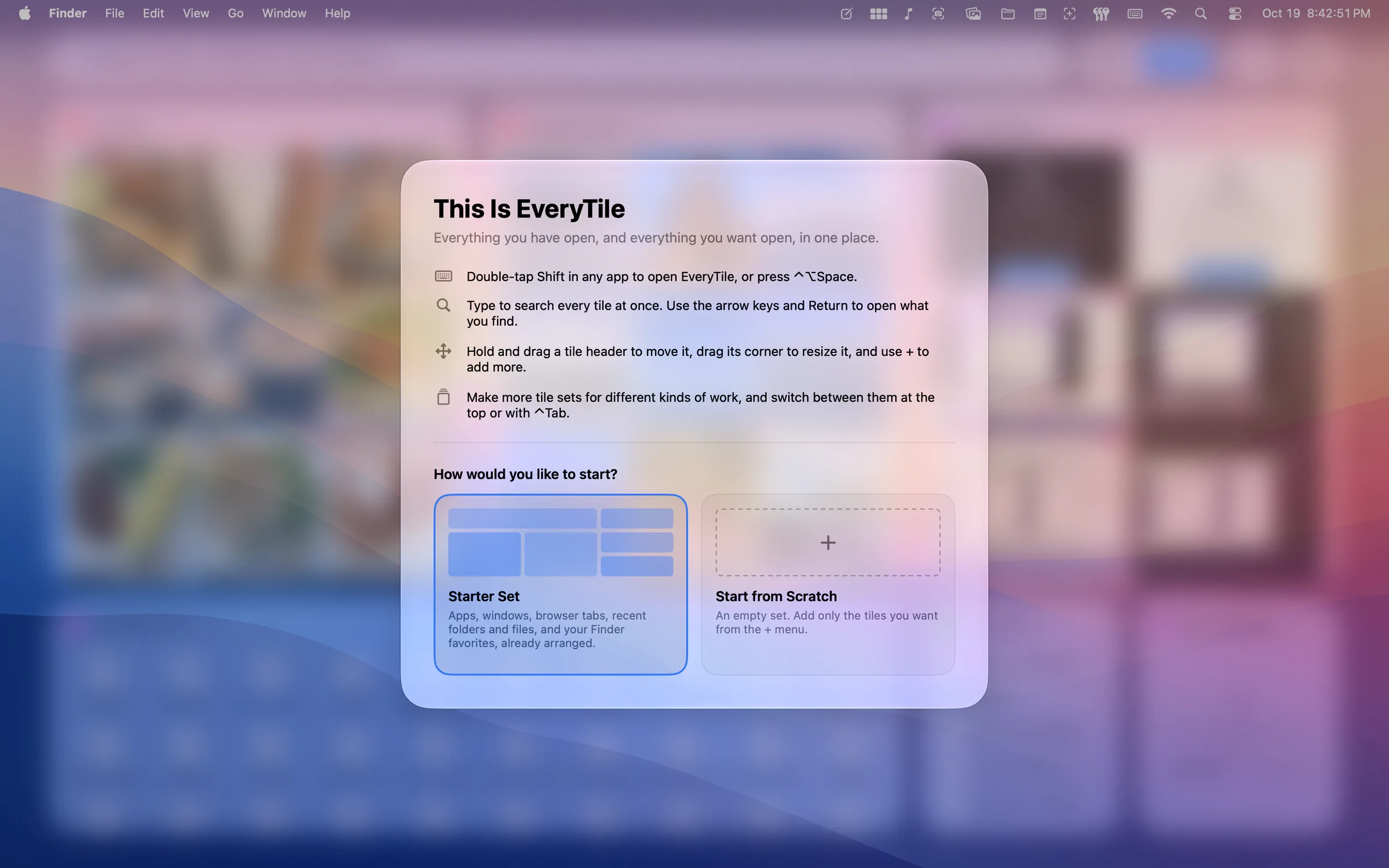 The first-run welcome card: tips for summoning, searching, arranging tiles and switching tile sets, then a choice between a Starter Set and starting from scratch