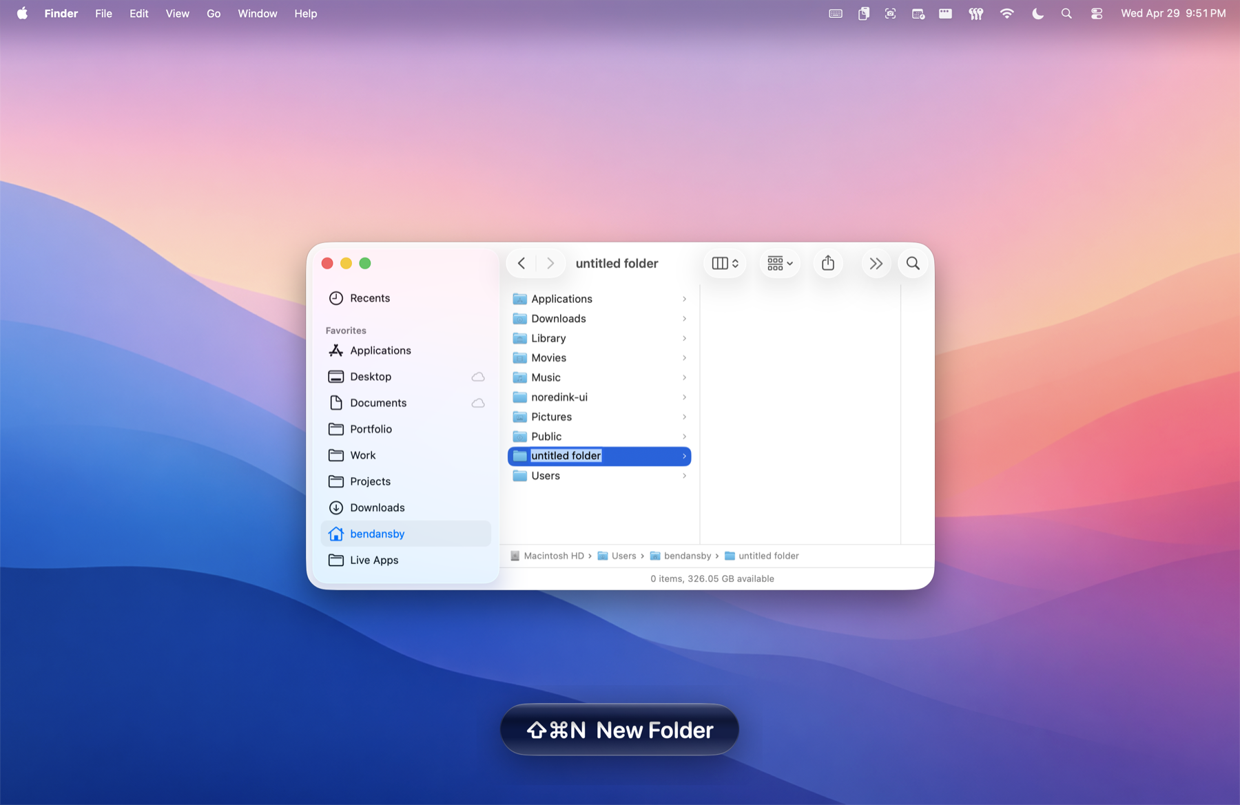 KeyStruck HUD overlay reading ⇧⌘N New Folder above the Finder