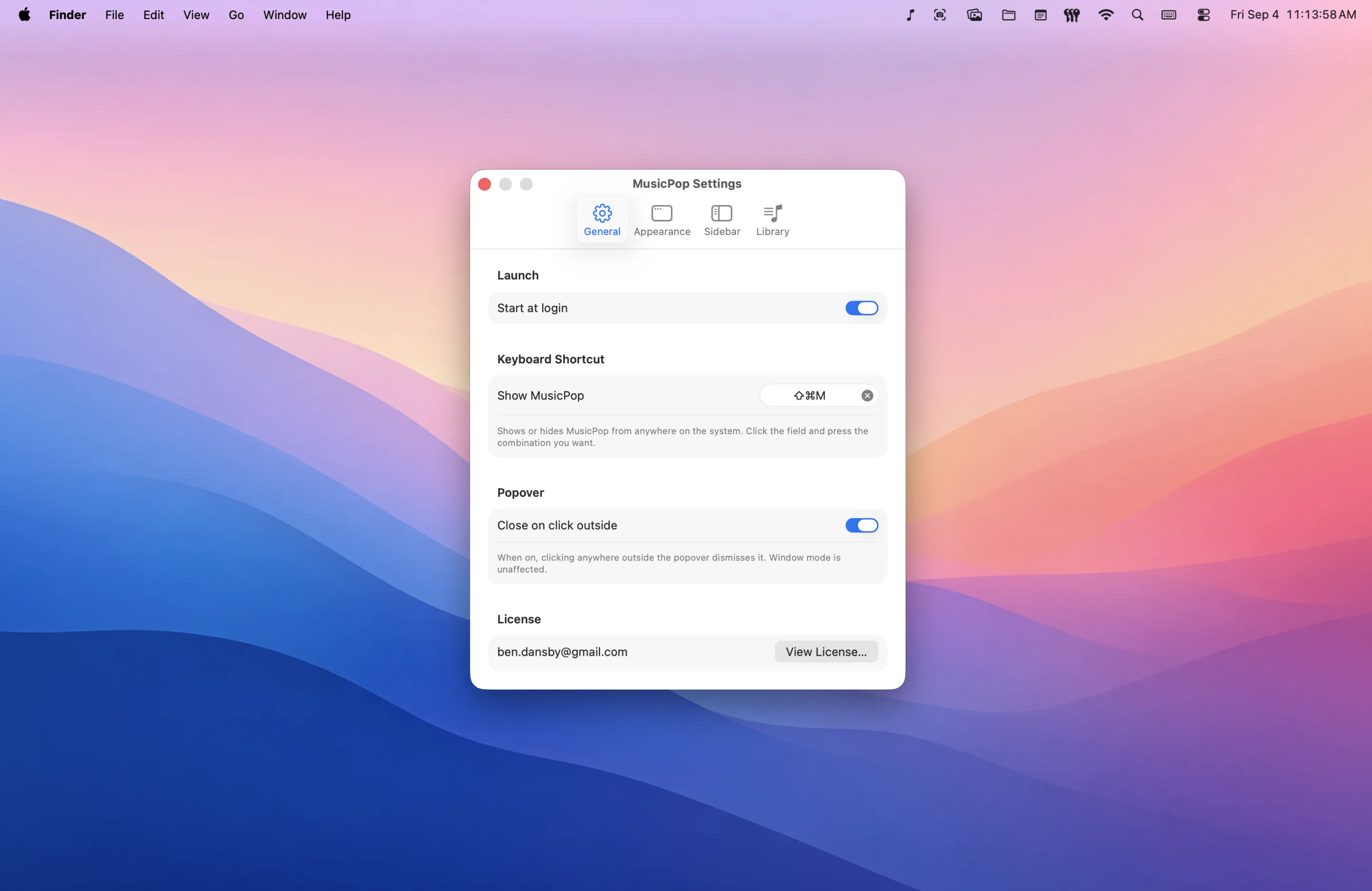 MusicPop's General settings: start at login, the summon shortcut, whether the popover closes on an outside click, and the licence